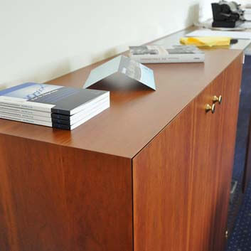 Wooden sideboard, all edges cut at miter (doors and sides).